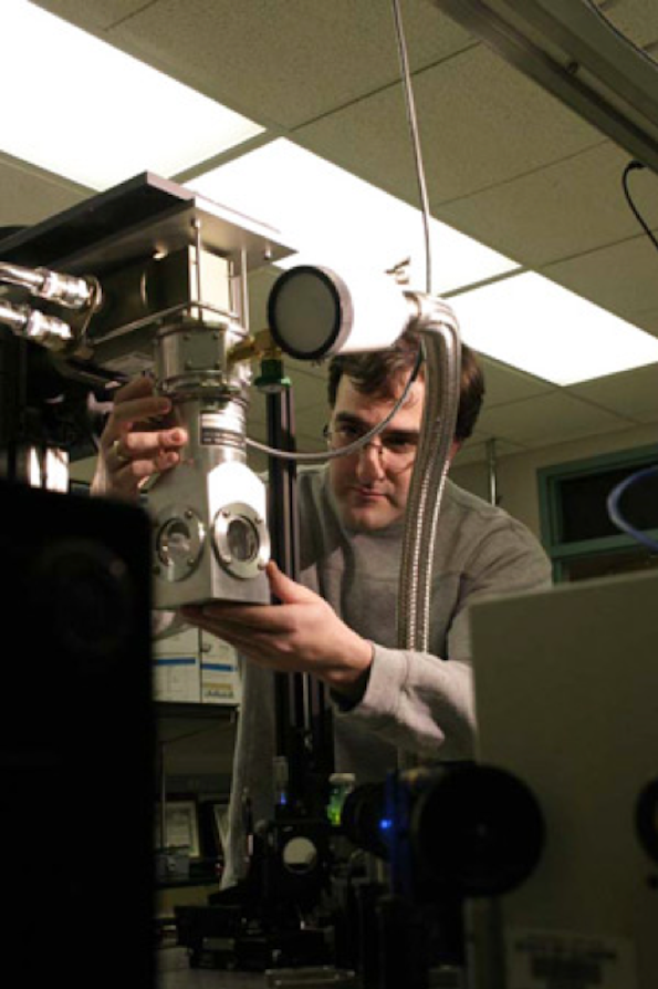 Dimitri Alexson works with equipment in the NanoEngineering Research Lab, where Dr. Michael Stroscio will conduct research on liquid condensates in cells