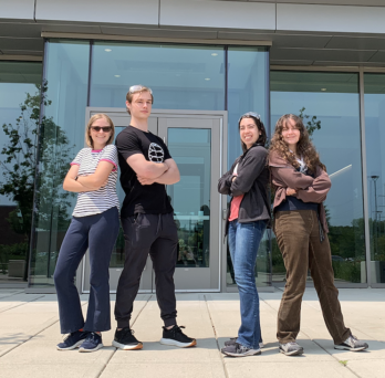 The four OQI fellows pose in front of their laboratory building at Argonne. (Image by Diana Dancea/Argonne National Laboratory.) 